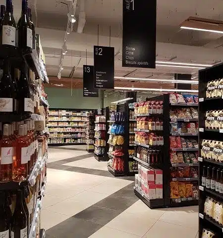 Signalétique : Kakémono suspendu Auchan Gourmand Le Prado - Semios